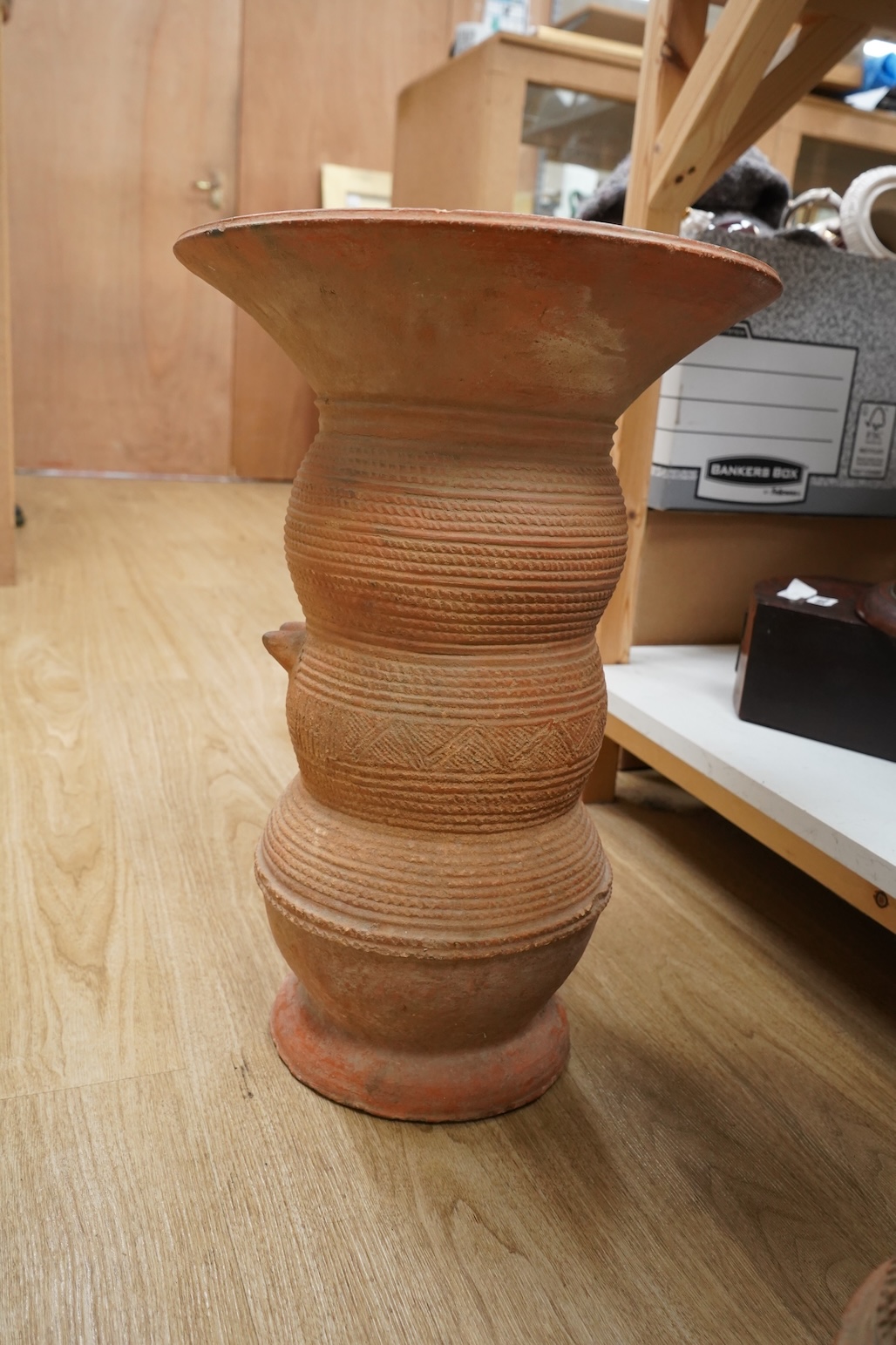 African art - a 20th century Nigerian terracotta nupe pot support, 51cm